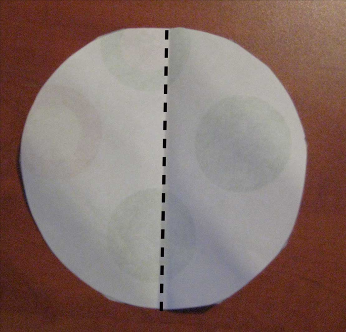 Fold the circle in half