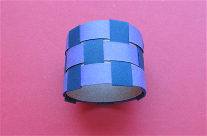 Your napkin ring is ready.

To make a bracelet  
Make a fist and measure around it with a string or strip of paper. 
Cut cardboard  the width you would like your bracelet to be and the length you have measured plus 1 inch, then do steps 5 until step 13
