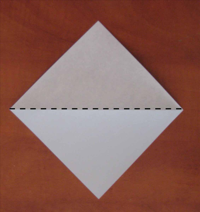 Place your square paper with the points on the top, bottom and sides.
Fold it in half horizontally.
Unfold


